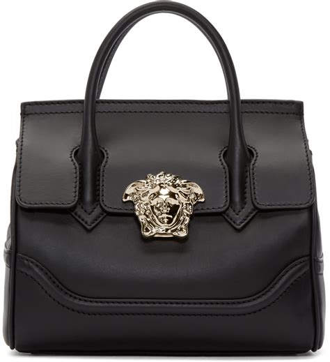 versace handtucch|Versace black label purses.